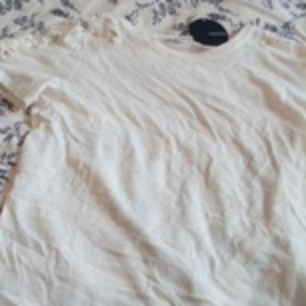 Cream t-shirt with lace on shoulders
